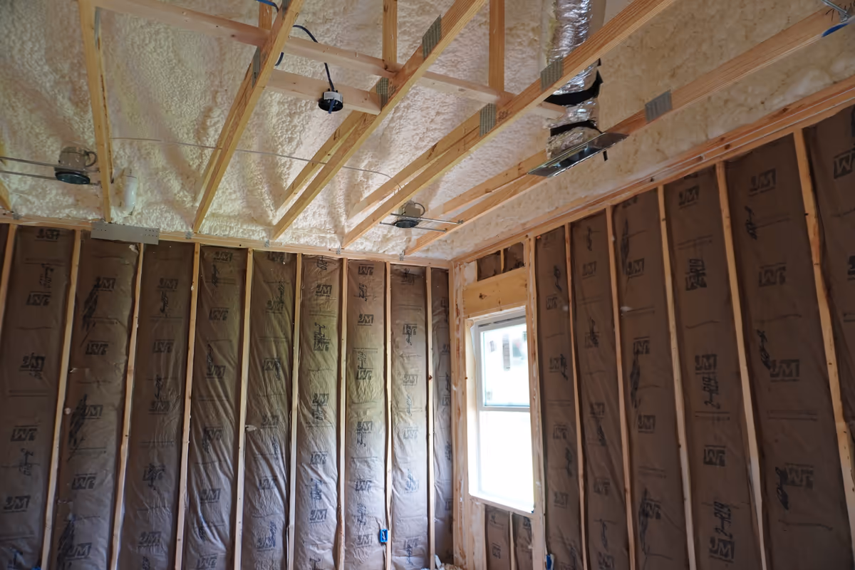 Second ceiling view of a fiberglass and spray foam insulation package.