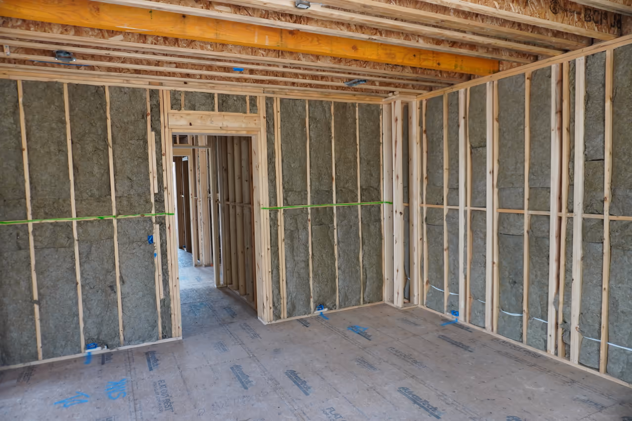 Rockwool insulation fitted through a room corner.