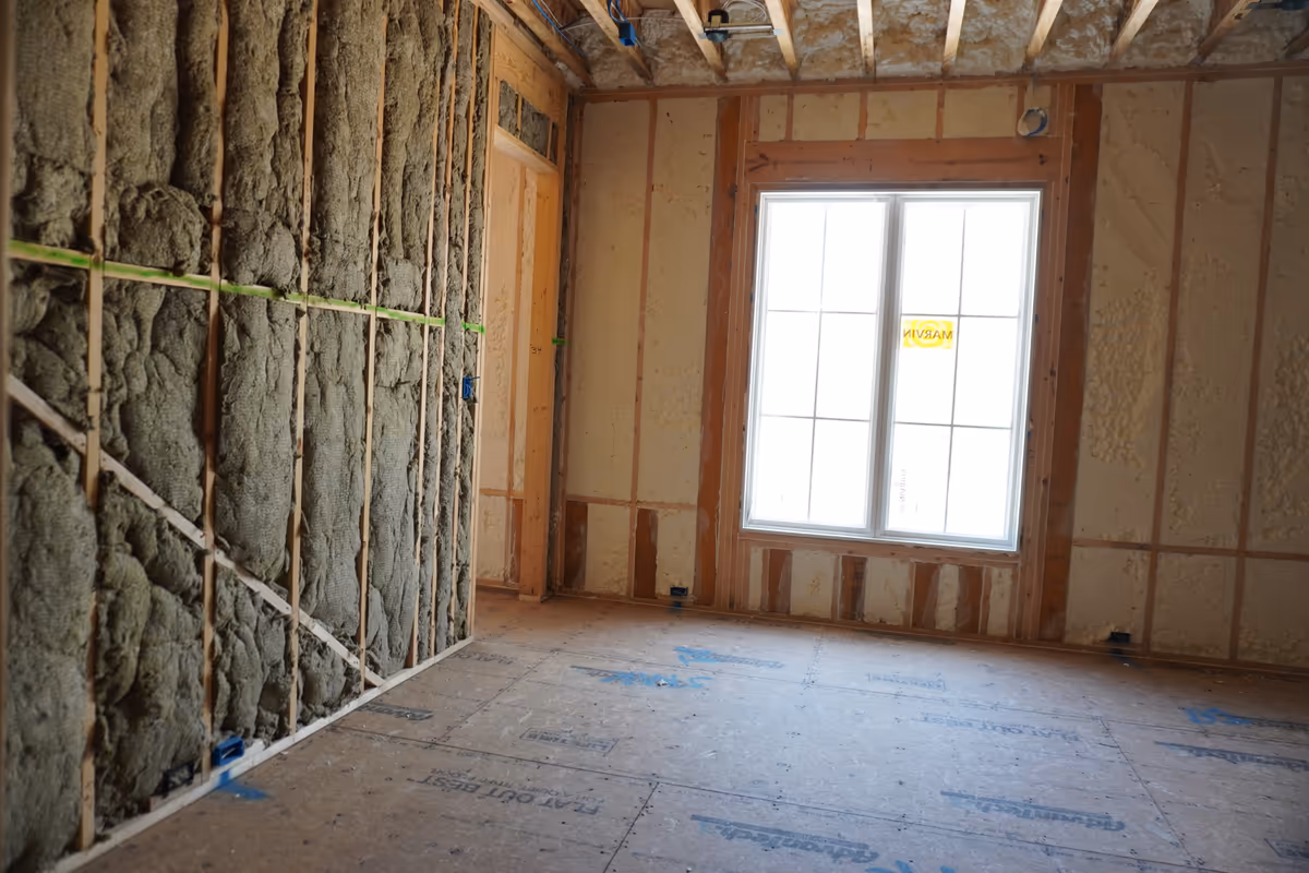 Rockwool insulation installed in a room with an open window wall.