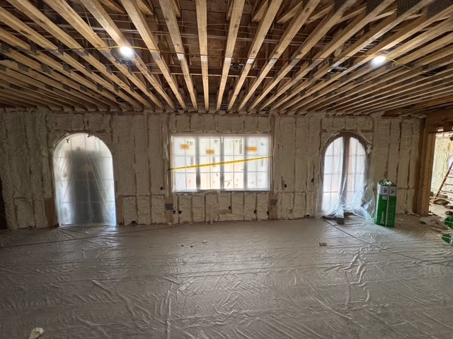 Interior room framing insulated with spray foam.