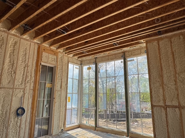 Spray foam installed in a sunroom framing assembly.